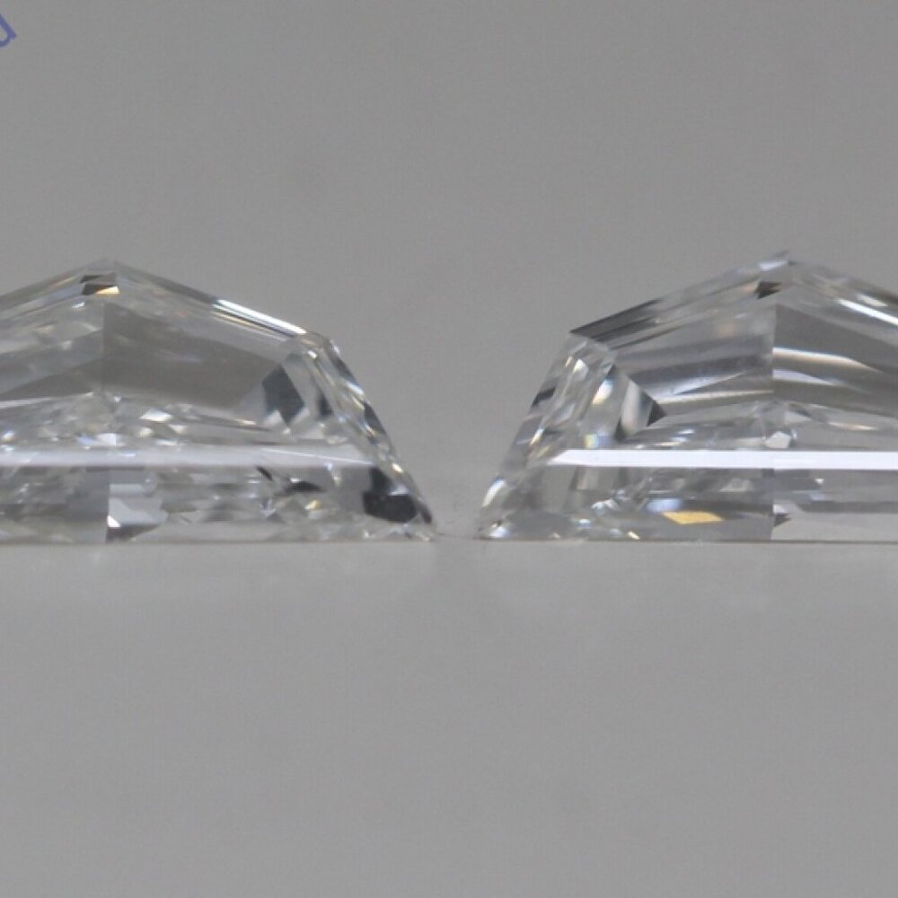 A Pair Of Shield Step Natural Loose Diamonds (0.47 Ct I Vs1) C52000038